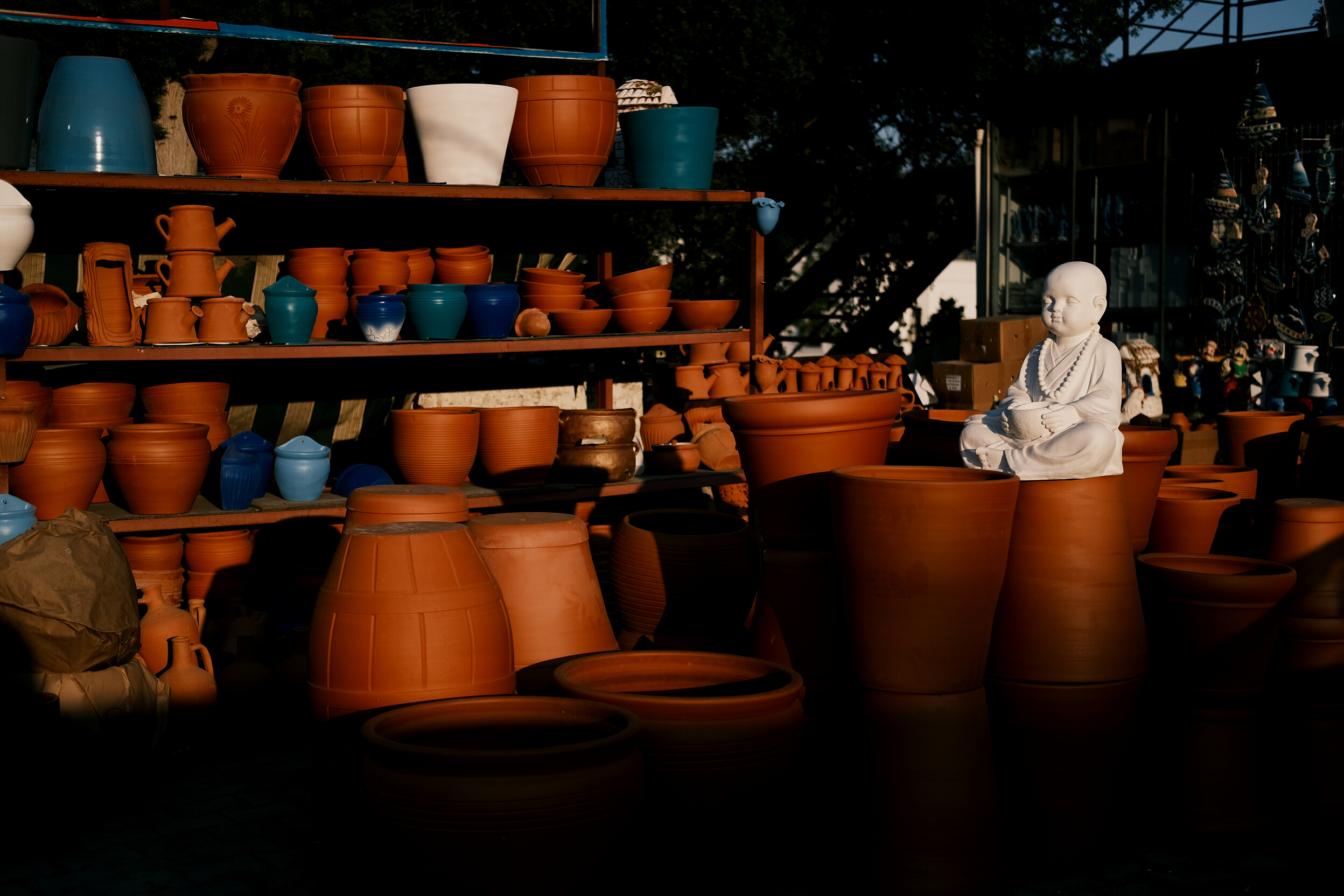 Clay Pots on Wooden Shelves 