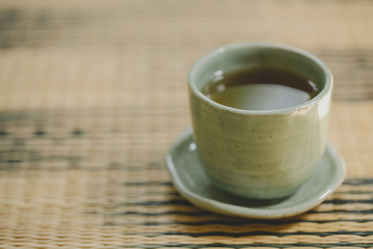 Cup of aromatic tea in ceramic cup