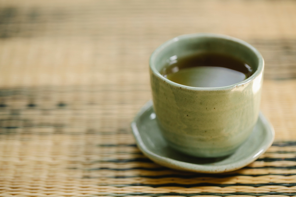 Cup of aromatic tea in ceramic cup